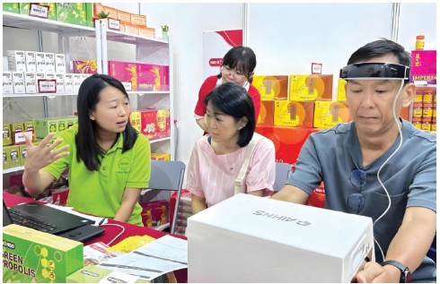 Going beyond standard offerings with free TCM consultation services and AI health check during roadshow.